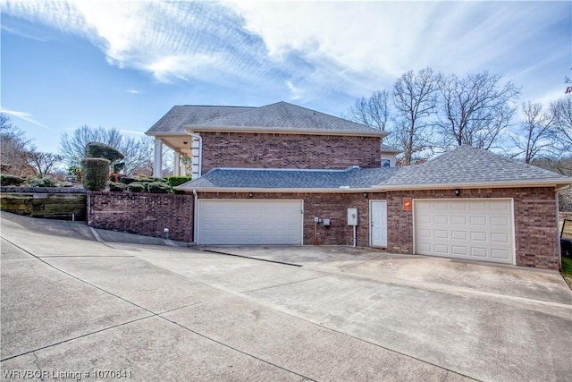 view of property exterior with a garage