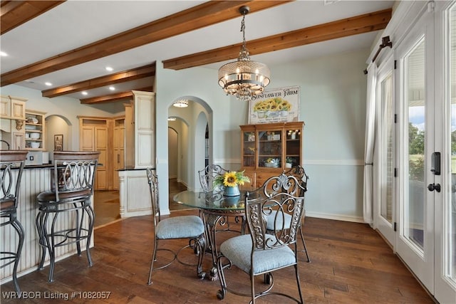 4504 Ridge Rd, Alma, AR 72921 - dining space featuring arched walkways, beamed ceiling, dark wood-style floors, recessed lighting, and a chandelier