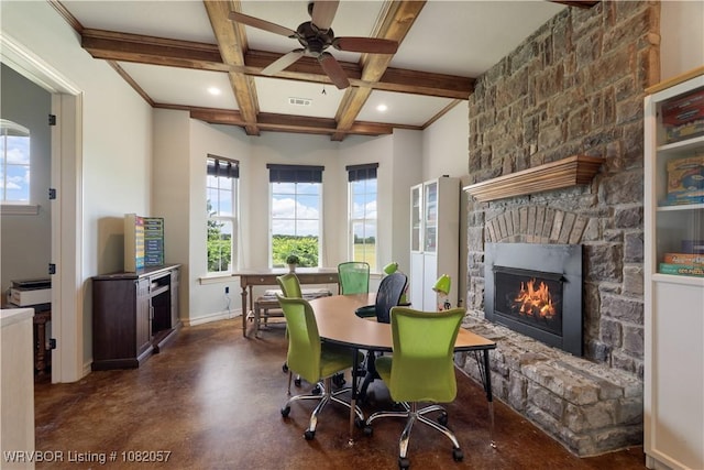 4504 Ridge Rd, Alma, AR 72921 - dining area featuring a fireplace, plenty of natural light, beam ceiling, a ceiling fan, and coffered ceiling
