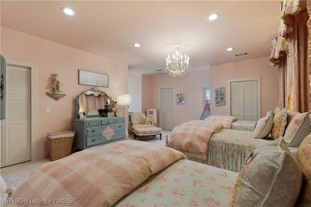 4504 Ridge Rd, Alma, AR 72921 - bedroom with a chandelier, recessed lighting, carpet floors, and two closets