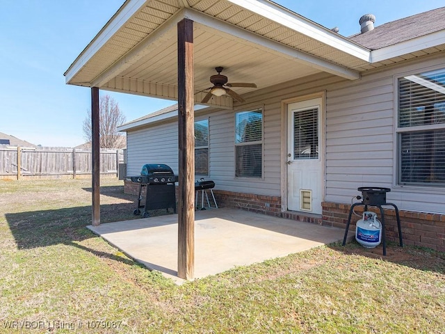 view of patio with ceiling fan and area for grilling