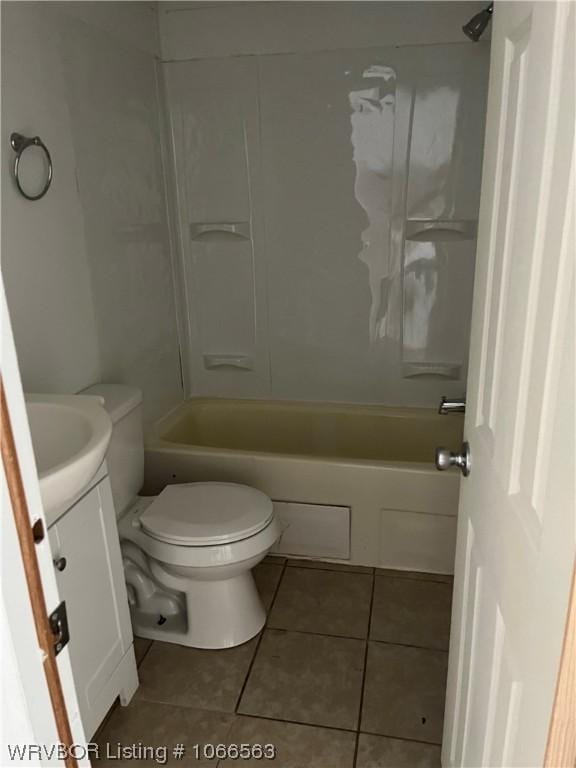 full bathroom with tile patterned flooring, vanity, bathing tub / shower combination, and toilet