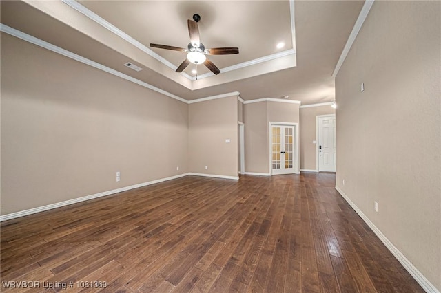 937 Forrest Park Way, Greenwood, AR 72936 - unfurnished room featuring a tray ceiling, a ceiling fan, dark wood-type flooring, ornamental molding, and baseboards