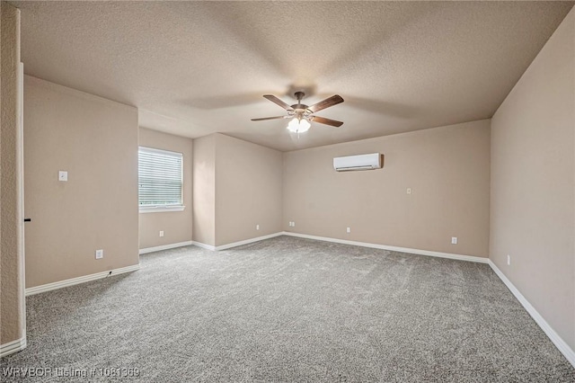 937 Forrest Park Way, Greenwood, AR 72936 - spare room with a wall mounted air conditioner, ceiling fan, carpet floors, a textured ceiling, and baseboards
