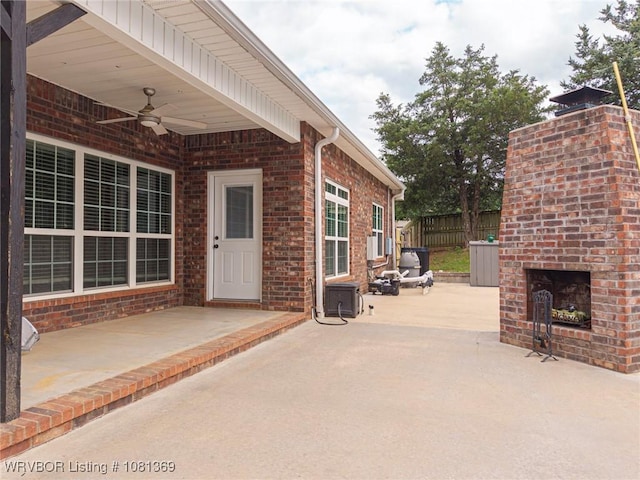 937 Forrest Park Way, Greenwood, AR 72936 - view of patio / terrace featuring an outdoor brick fireplace and ceiling fan