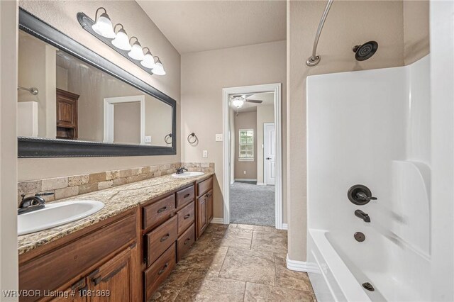 937 Forrest Park Way, Greenwood, AR 72936 - bathroom featuring baseboards, double vanity, washtub / shower combination, and a ceiling fan