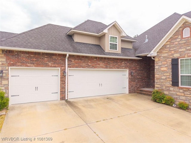937 Forrest Park Way, Greenwood, AR 72936 - craftsman-style house featuring driveway, board and batten siding, roof with shingles, and brick siding