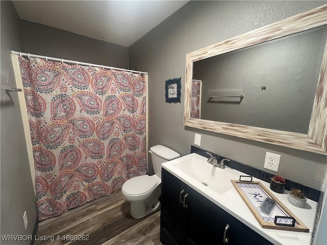 306 Dogwood, Pocola, OK 74902 - full bath with vanity, a shower with curtain, toilet, and wood finished floors