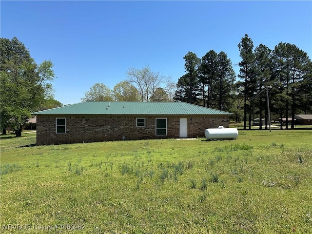 306 Dogwood, Pocola, OK 74902 - rear view of property with metal roof and a lawn