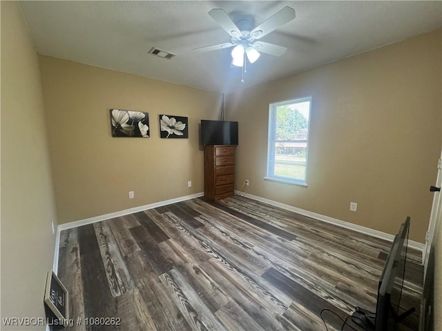 306 Dogwood, Pocola, OK 74902 - unfurnished bedroom with visible vents, baseboards, a ceiling fan, and wood finished floors