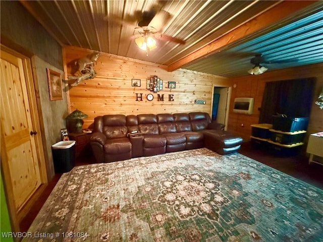 12878 128th St, Gore, OK 74435 - living room featuring a ceiling fan, wooden walls, and wood ceiling with exposed beams