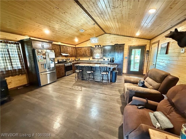 12878 128th St, Gore, OK 74435 - living room with wooden walls, lofted ceiling, hardwood / wood-style flooring, and wooden ceiling