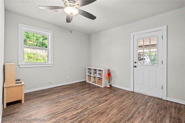 1003 Blair St, Pocola, OK 74902 - rec room featuring healthy amount of natural light, wood finished floors, and baseboards