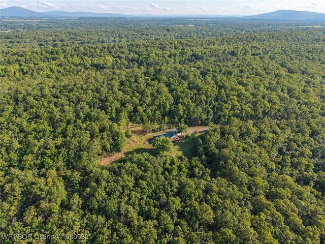 1003 Blair St, Pocola, OK 74902 - aerial view of property and surrounding area with a forest and a mountain backdrop