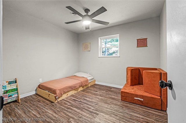 1003 Blair St, Pocola, OK 74902 - bedroom featuring wood finished floors, baseboards, and ceiling fan
