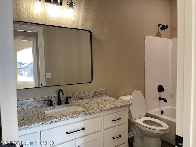 full bathroom featuring vanity, toilet, and shower / bathtub combination