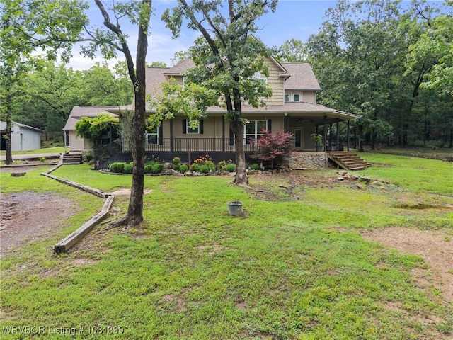 1760 N Ulmer St, Greenwood, AR 72936 - view of front of home with a front lawn and covered porch