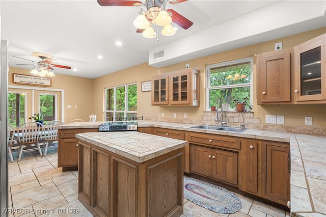 1760 N Ulmer St, Greenwood, AR 72936 - kitchen with a sink, a ceiling fan, a peninsula, healthy amount of natural light, and recessed lighting