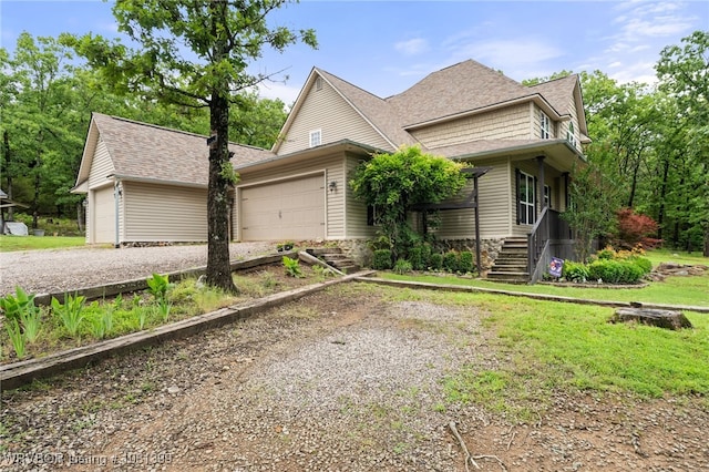 1760 N Ulmer St, Greenwood, AR 72936 - view of front of house featuring driveway, an attached garage, and a shingled roof