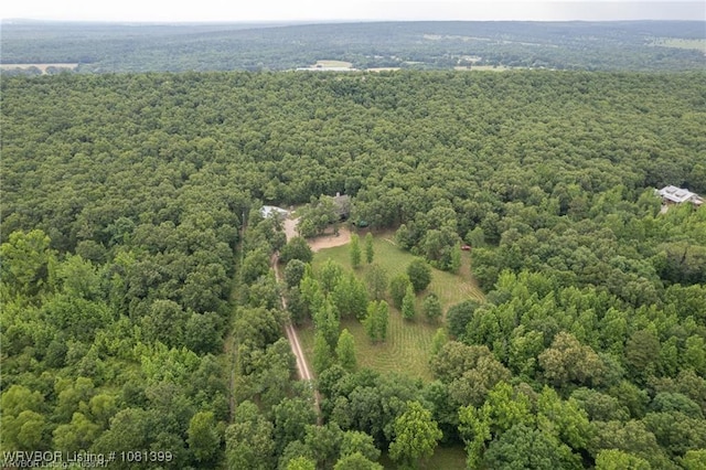 1760 N Ulmer St, Greenwood, AR 72936 - aerial view of property and surrounding area featuring a heavily wooded area