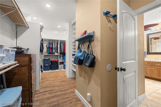 1760 N Ulmer St, Greenwood, AR 72936 - spacious closet featuring light wood-type flooring and a sink