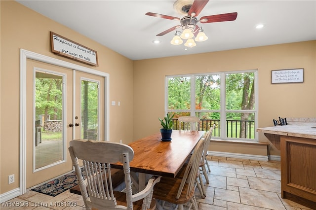 1760 N Ulmer St, Greenwood, AR 72936 - dining space featuring french doors, baseboards, ceiling fan, recessed lighting, and light stone finish flooring