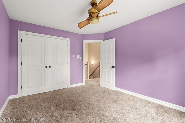 1760 N Ulmer St, Greenwood, AR 72936 - unfurnished bedroom with carpet, baseboards, and a closet