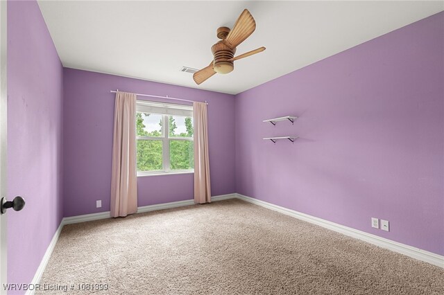 1760 N Ulmer St, Greenwood, AR 72936 - unfurnished room with carpet, ceiling fan, and baseboards