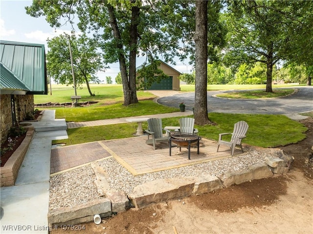 exterior space with an outdoor fire pit