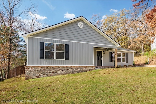 view of front of property with a front lawn