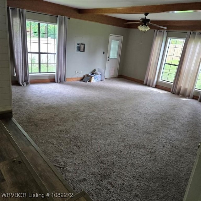 10704 Castleton St, Fort Smith, AR 72908 - carpeted empty room with a ceiling fan and beamed ceiling