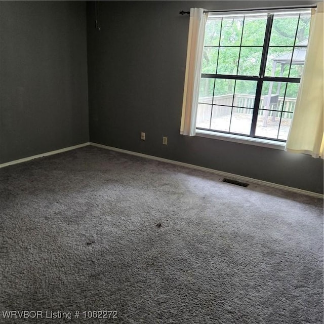 10704 Castleton St, Fort Smith, AR 72908 - carpeted empty room with baseboards