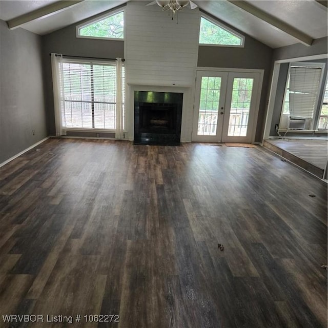10704 Castleton St, Fort Smith, AR 72908 - unfurnished living room featuring ceiling fan, beam ceiling, dark wood finished floors, french doors, and a fireplace with flush hearth