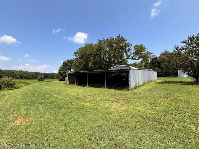 5525 Slaytonville Rd, Hackett, AR 72937 - view of yard featuring an outbuilding and a carport