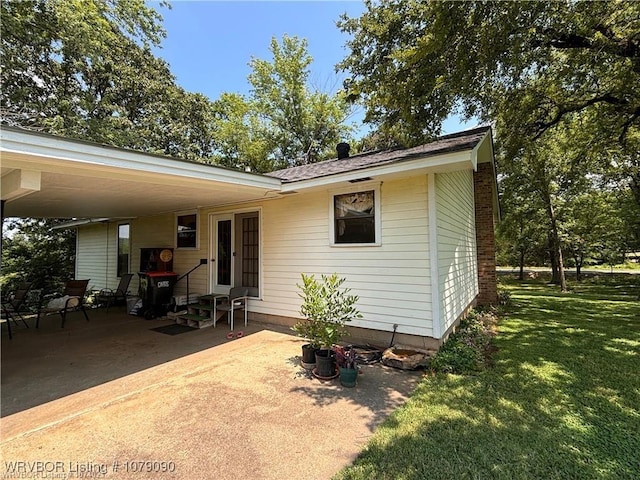 5525 Slaytonville Rd, Hackett, AR 72937 - rear view of property with a lawn