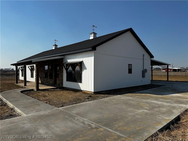 exterior space featuring a carport