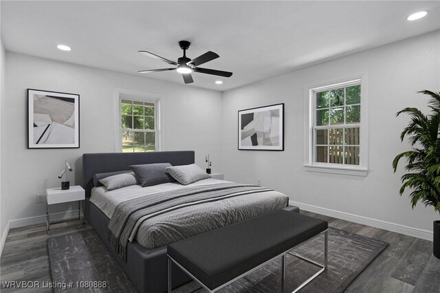 bedroom with baseboards, recessed lighting, dark wood finished floors, and a ceiling fan