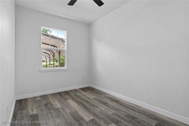 unfurnished room featuring wood finished floors, ceiling fan, and baseboards