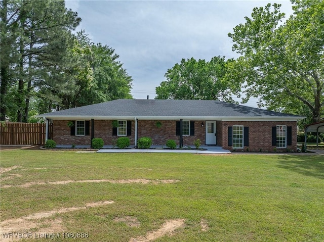single story home featuring brick siding