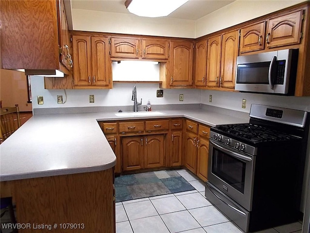 kitchen with sink and stainless steel appliances