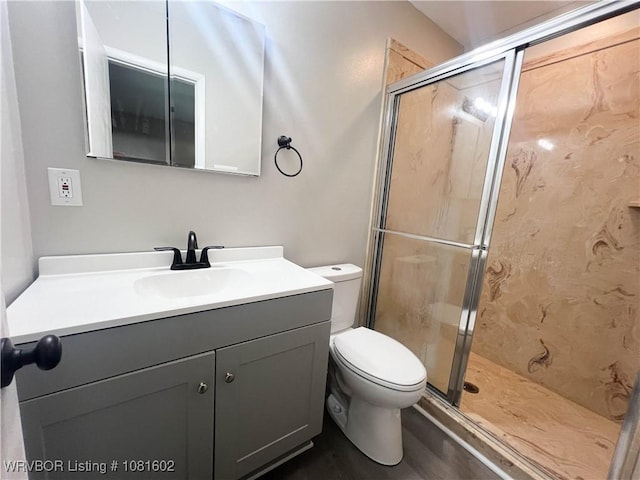 120 W Gary St, Greenwood, AR 72936 - bathroom featuring vanity, a stall shower, and toilet