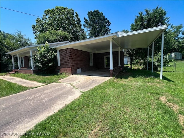 120 W Gary St, Greenwood, AR 72936 - view of front of house featuring concrete driveway, an attached carport, and covered porch