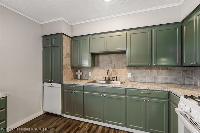 kitchen with green cabinets, crown molding, sink, dark hardwood / wood-style floors, and a textured ceiling