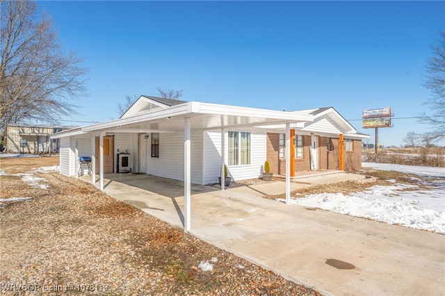 view of front of house with a carport