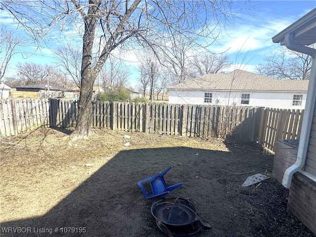 view of yard featuring a fenced backyard