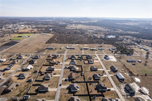 birds eye view of property with a residential view