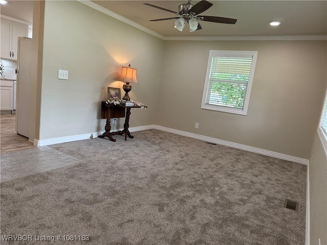 1304 S Elm St, Paris, AR 72855 - carpeted empty room featuring ceiling fan, baseboards, crown molding, and recessed lighting