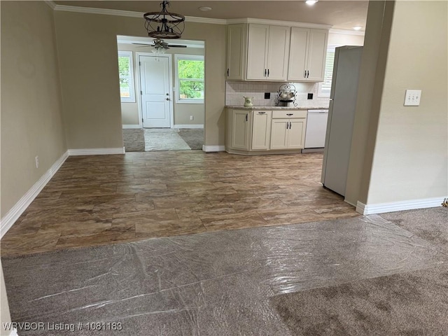 1304 S Elm St, Paris, AR 72855 - kitchen featuring white appliances, ornamental molding, ceiling fan, baseboards, and backsplash