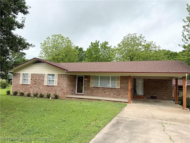 1304 S Elm St, Paris, AR 72855 - single story home with brick siding, a front lawn, concrete driveway, and an attached carport