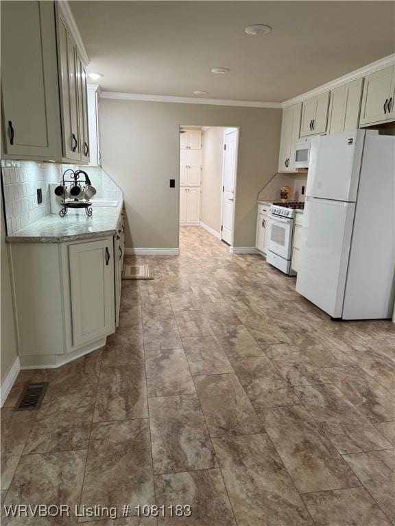 1304 S Elm St, Paris, AR 72855 - kitchen featuring white appliances, decorative backsplash, baseboards, ornamental molding, and recessed lighting